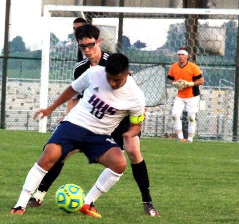 Senior Luis Vargas keeps ball from TA player.