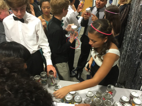 Students take favors at the end of the dance. 