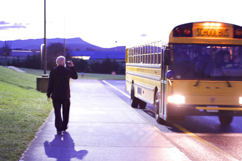 Principal Eye greets one of the first busses. 